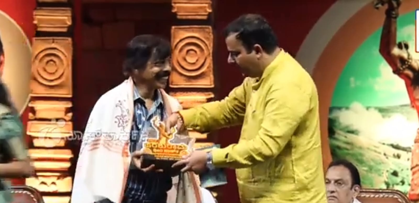 Honored by Sunil Kumar, The Cultural Minister of  Karnataka in Feb 2023
